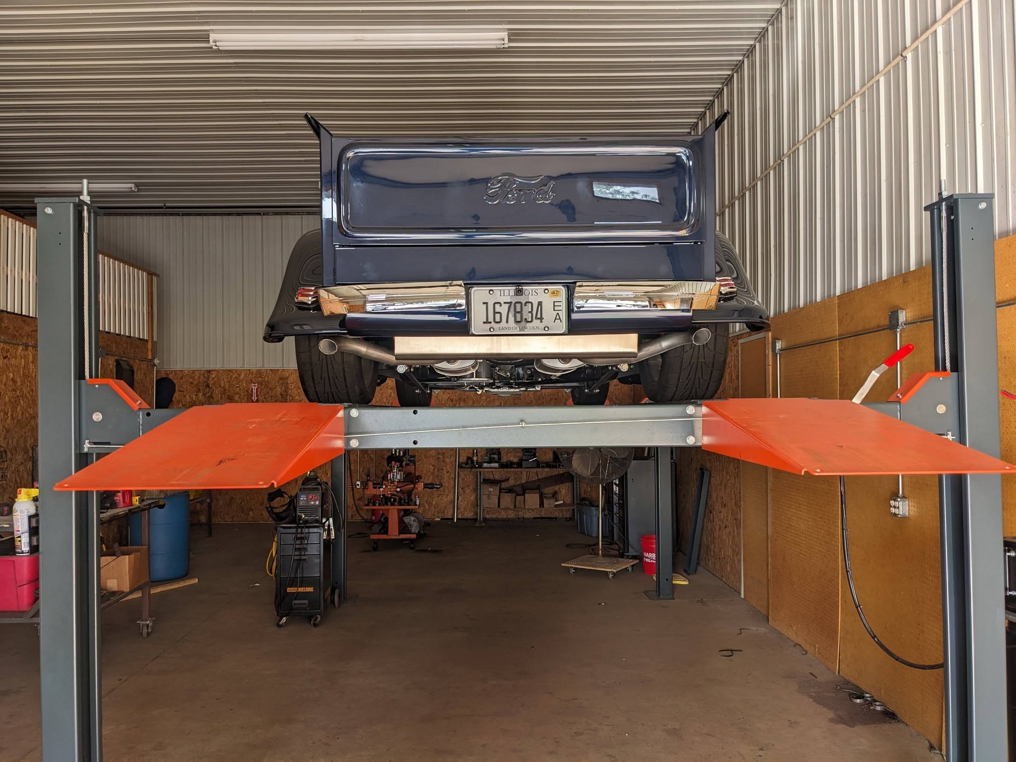 Pickup on the lift in the shop