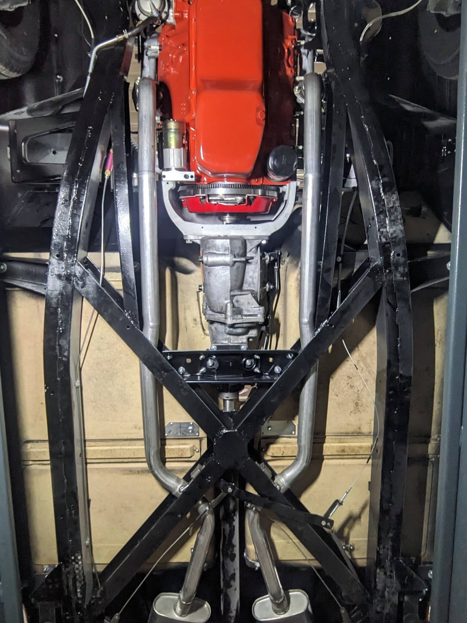 Exhaust work under the 1962 Corvette